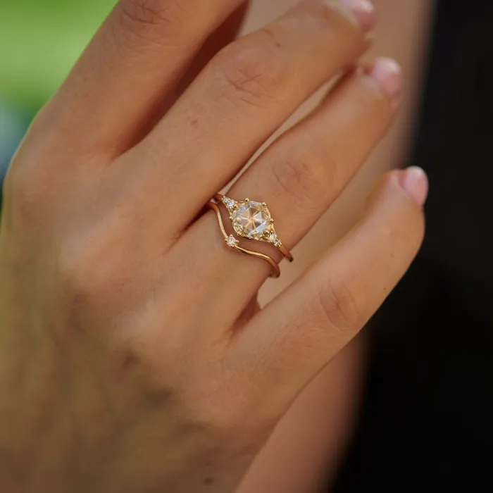 Rings Curved Golden Band Embellished with a Brilliant Diamond ARTEMER Rings Curved Golden Band Embellished with a Brilliant Diamond ARTEMER